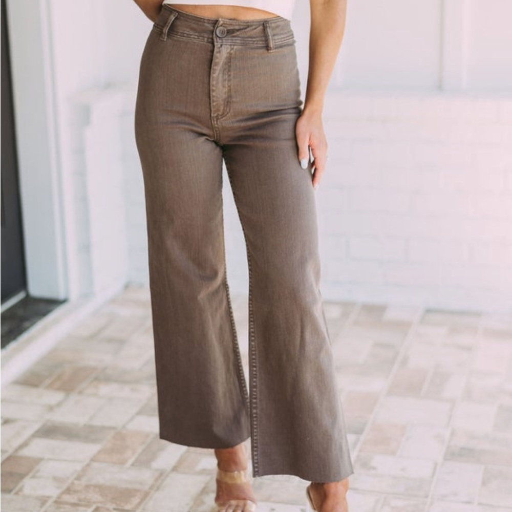 These three boutique, size small, brown high waisted jeans